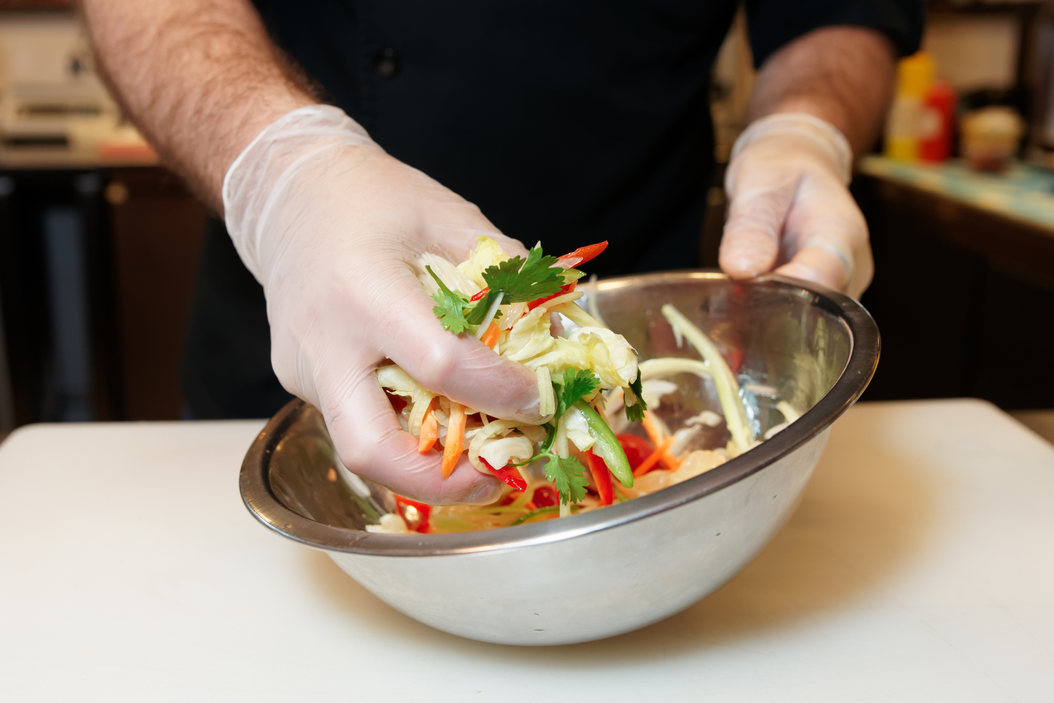 Chef is cooking a vegetarian salad